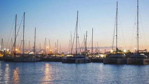 Catamarans in marina at dusk Stock Footage 83309481