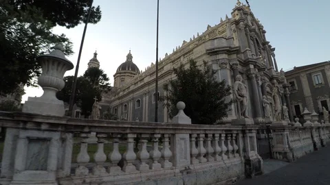 Catania baroque cathedral 4k moving view along the outside facade and statues Stock Footage 108663564