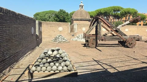 Catapult and stone balls Stock Footage 346641285