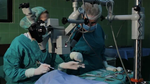 Cataract eye surgery. Surgeons team performing operation eye cataract. Stock Footage 34630009