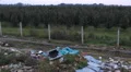 Catastrophe nature VS disease  ,orchard  near dump trash Vidéos HD
