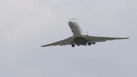 Catch the arrival of a passenger aircraft touching down on the runway Stock Footage 332576025