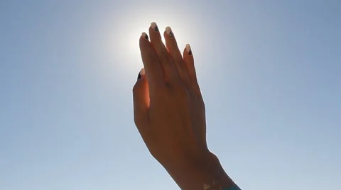 Catch the Sun in Hands Stock Footage 65448009