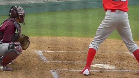 A catcher makes a play at a baseball game, slow motion. Stock Footage