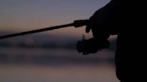 Catching fish at sunrise Stock Footage 102949785