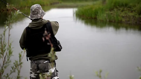 Catching Pike in a lake Stock Footage 36646037
