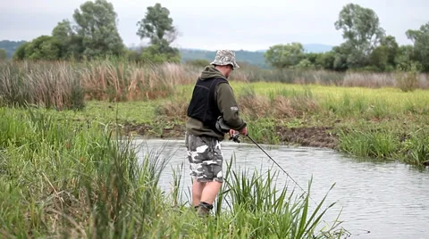 Catching Pike in a lake Stock Footage 36646942