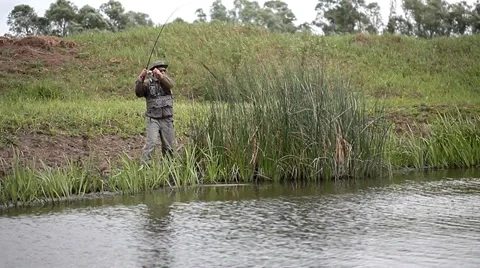 Catching Pike in a river Stock Footage 36647070
