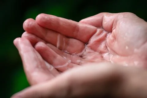 Catching raindrops Stock Photos