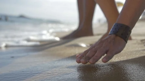 Catching sand in slow motion 3 Stock Footage 128074821