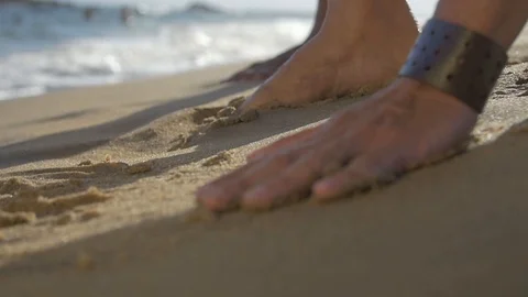 Catching sand in slow motion Stock Footage 128074810