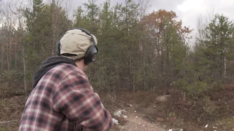 Catching shell from a shotgun 스톡 동영상 100137865