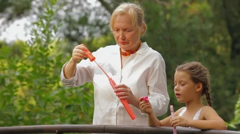 Catching Soap Bubbles Stock Footage 52689957
