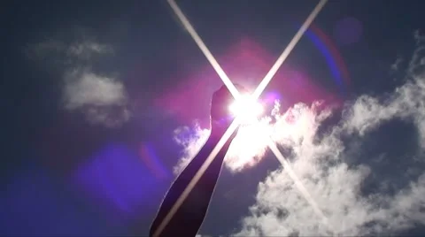 Catching sun in hand Stock Footage 8659732