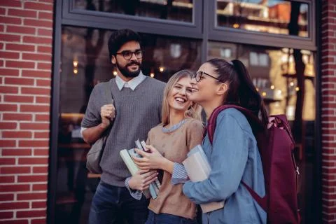 Catching up on their way to class Stock Photos