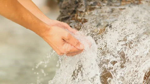 Catching water with hands Stock Footage 525438
