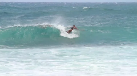 Catching a wave in Hawaii.  Video stock 50979495