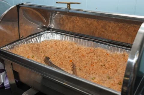 Catered side dish in the warmer Stock Photos