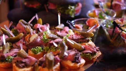 Catering Buffet Platter with Roast Beef Bruschetta Roast Beef and Pickles Video stock 336808626