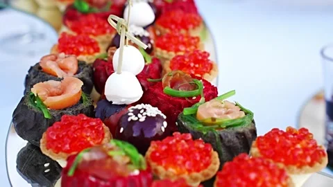 Catering display with various appetizers at an event Stock Footage 332646668