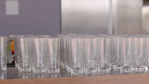 Catering at event background. Empty glassware during preparation for event. Stock Footage 277850441