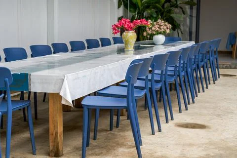 Catering long table seating and conference long table in restaurant Stock Photos