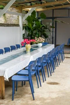 Catering long table seating and conference long table in restaurant Stock Photos