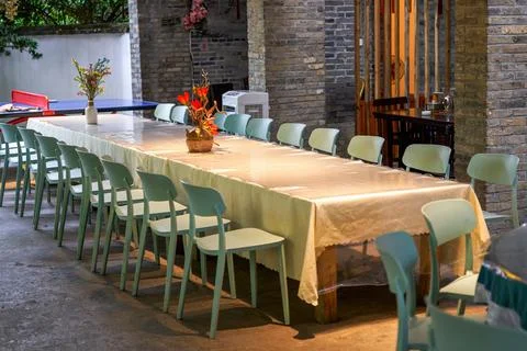 Catering long table seating and conference long table in restaurant Stock Photos