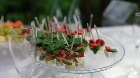 Catering service on banquet table with snacks in restaurant Stock Footage 336800436