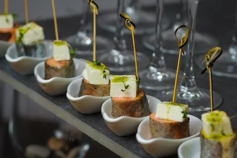 Catering service. Snacks for guests on the table. Stock Photos