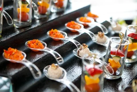 Catering services background with snacks on guests table Stock Photos