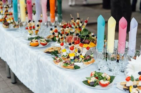 Catering services background with snacks on guests table in restaurant at event Stock Photos