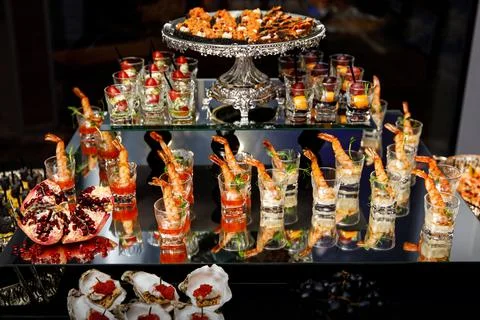 Catering services with snacks on guests table in the restaurant at the event  Stock Photos