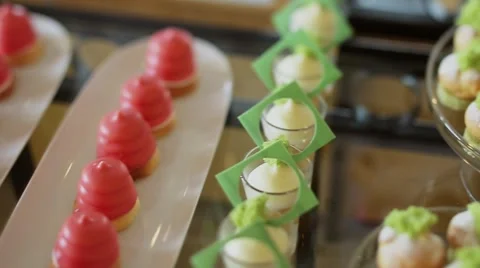 Catering sweets on table Stock Footage 56869479