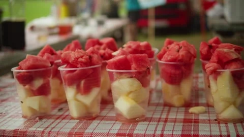 Catering table with fruit salad canape. Fruit melon and watermelon and pineapple Stock Footage 254432529