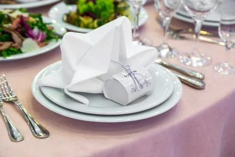 Catering table set service with silverware, napkin and glass at restaurant Foto stock