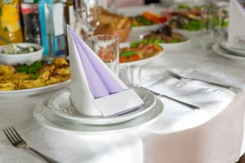 Catering table set service with silverware, napkin and glass at restaurant Foto stock