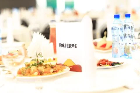 Catering table set service with silverware Stock Photos