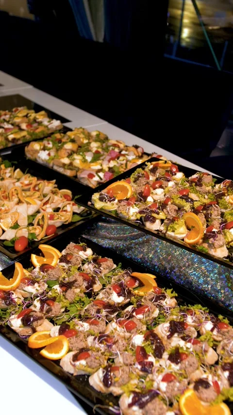 Catering trays with assorted appetizers on conference tables Stock Footage 335694827