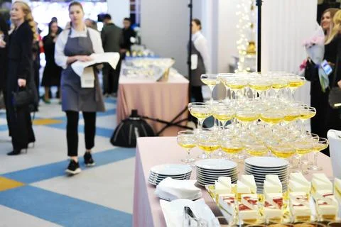 Catering work. Serving guests in the lobby of the concert hall before the s.. Stock Photos