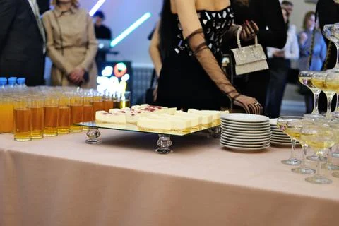 Catering work. Serving guests in the lobby of the concert hall before the s.. Stock Photos