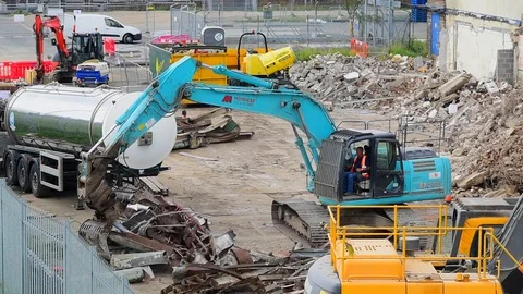 Caterpillar machinery processing scrap metal uk Stock Footage 121255921
