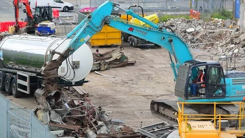Caterpillar machinery processing scrap metal uk Stock Footage 121256764