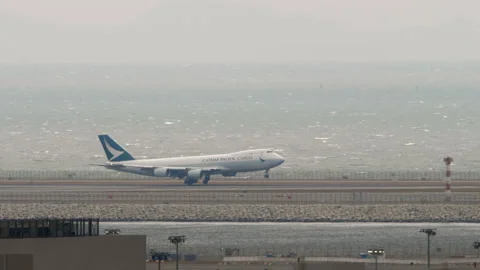 Cathay Pacific Cargo Boeing 747-8F Lands at Hong Kong Airport Stock Footage 345275519