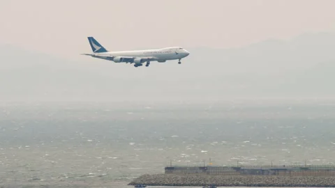 Cathay Pacific Cargo Boeing 747-8F B-LJD approaching Hong Kong over sea Stock Footage 346983821