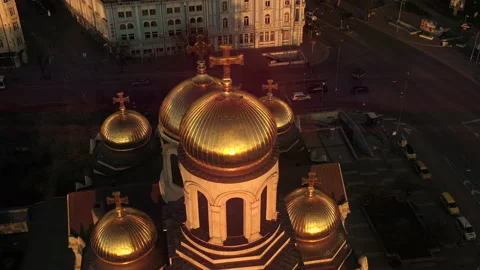 Cathedral and 2023 easter for orthodox. Aerial shot Golden Domes at sunset Stock Footage 236359909