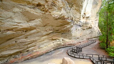 Cathedral Cave at end of walking trail of Carnarvon Gorge,Indigeous rock art,QLD Stock Footage 140609648