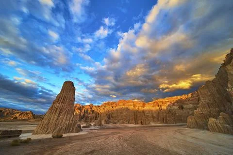 Cathedral Gorge Rock Formation Dramatic Sky and Golden Hour Light in Nevada Stock Photos