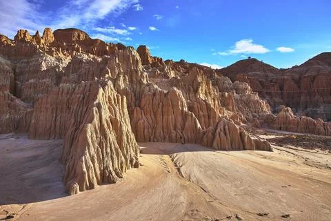 Cathedral Gorge State Park Dramatic Eroded Rock Formations Under Blue Sky Stock Photos