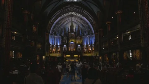 Cathedral inside, people walking around. Not graded. Video stock 95556152